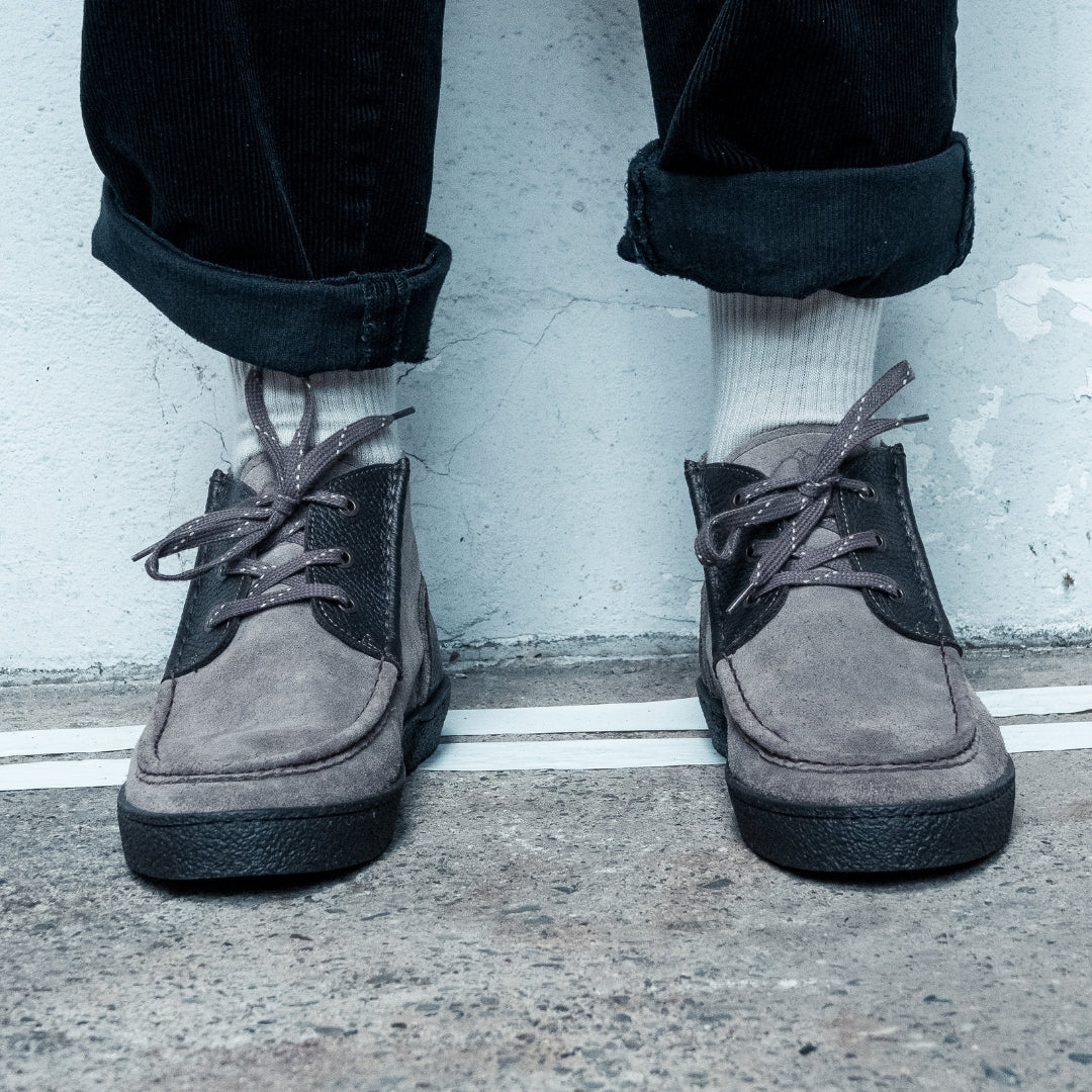 OSWEN Konrad shoes in Taupe suede and leather worn with casual trousers.