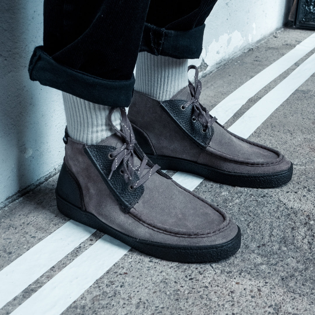 OSWEN Konrad shoes in Taupe suede and leather worn with casual trousers.
