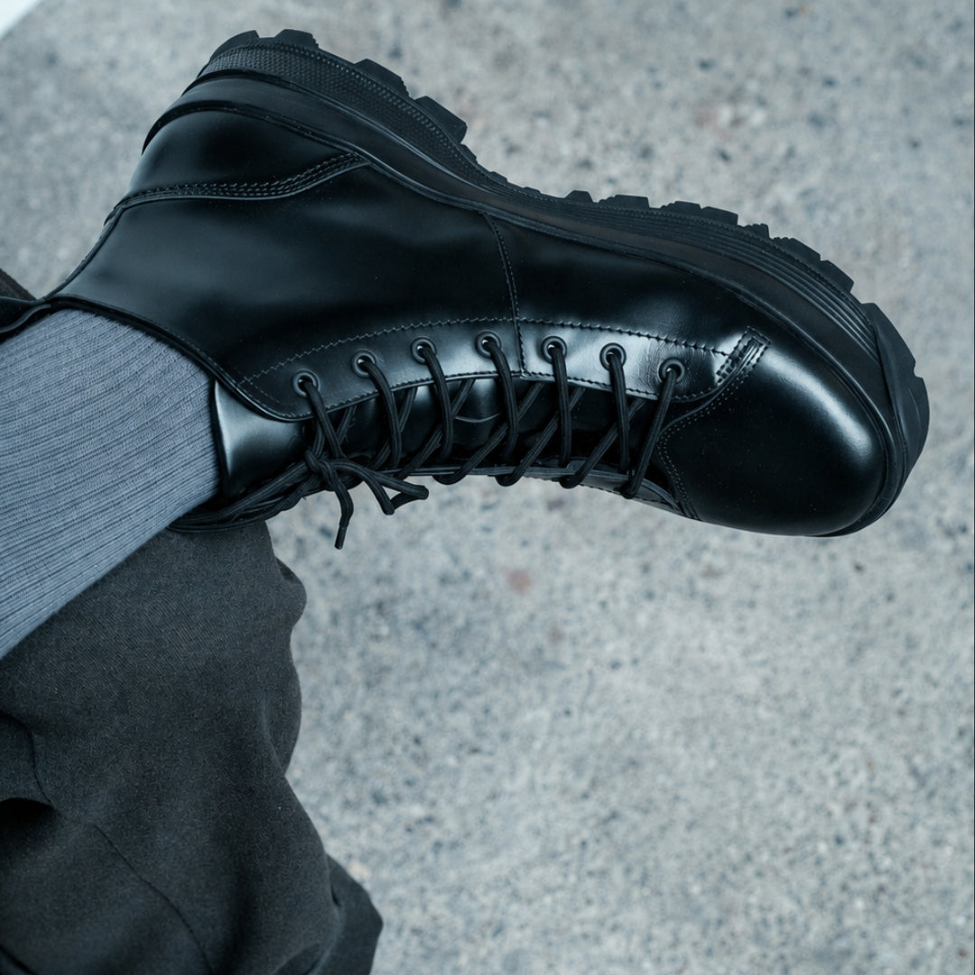 OSWEN City Explorer black leather lace-up boots worn outdoors