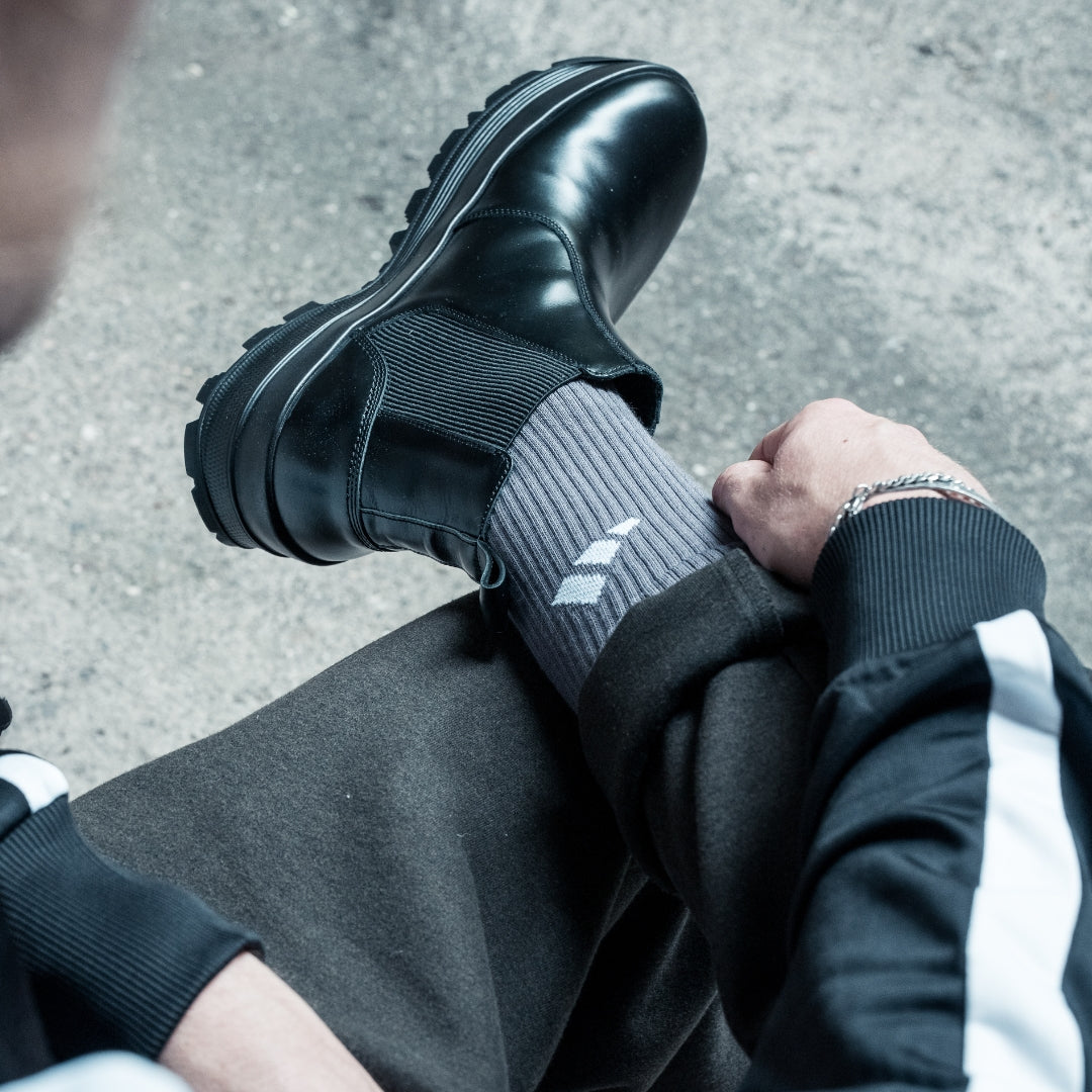 OSWEN City Commuter black leather Chelsea boot worn outdoors