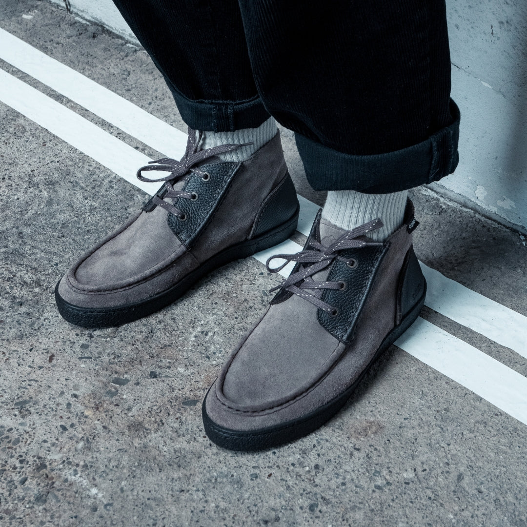 OSWEN Konrad shoes in Taupe suede and leather worn with casual trousers.